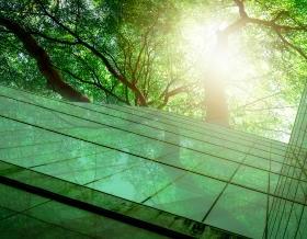 Sustainble green building. Eco-friendly building. 可持续发展的玻璃办公楼，树木减少二氧化碳. 绿色办公环境. 企业建筑减少二氧化碳排放. Safety glass.